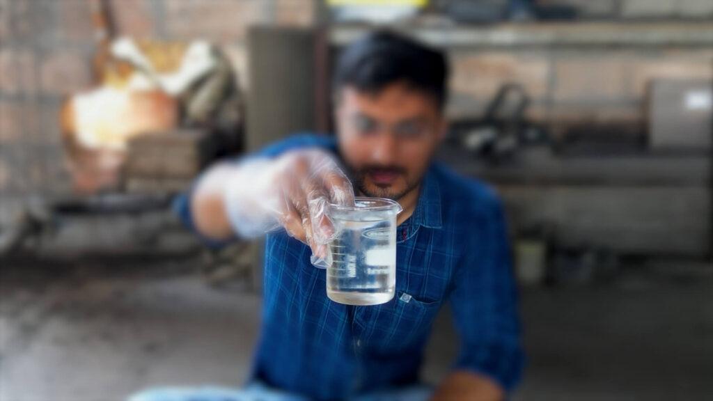 Regenerated MMA monomer sample undergoing quality inspection at MMA Chemicals’ production facility in India